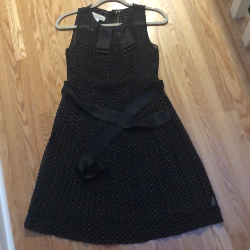 Black polka dot pleated dress